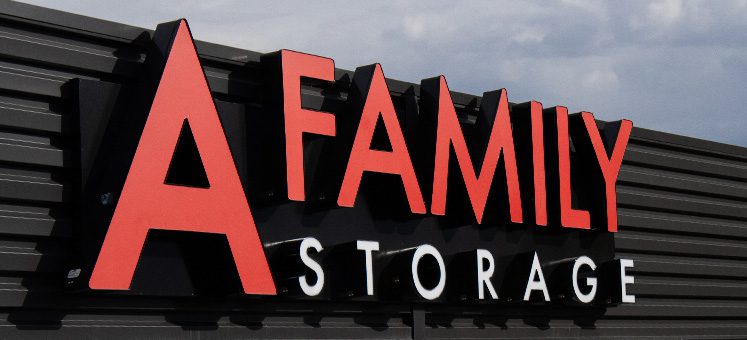 New Red 'A Family Storage' signage outside building